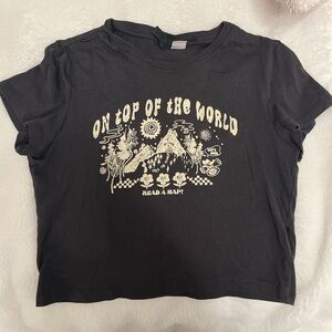 Dark gray top with "On Top of the World" design
